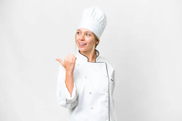 Young Chef Woman Isolated White Background Pointing Side Present Product — Foto Stock
