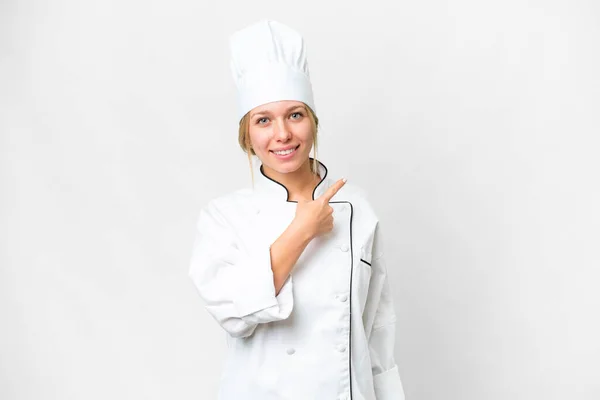 Young Chef Woman Isolated White Background Pointing Side Present Product — Stock Photo, Image