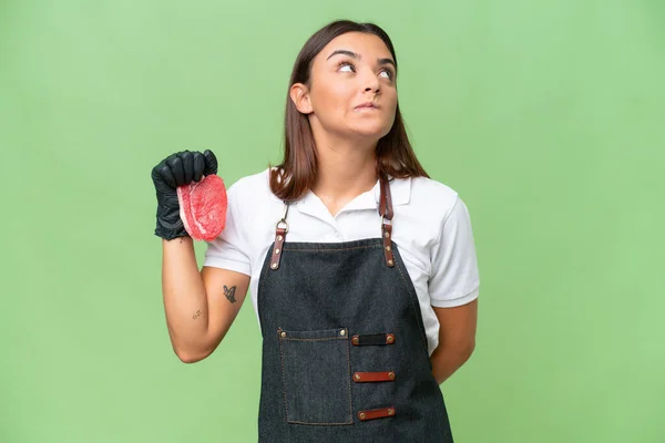 Butcher Woman Wearing Apron Serving Fresh Cut Meat Isolated Green — Foto de Stock