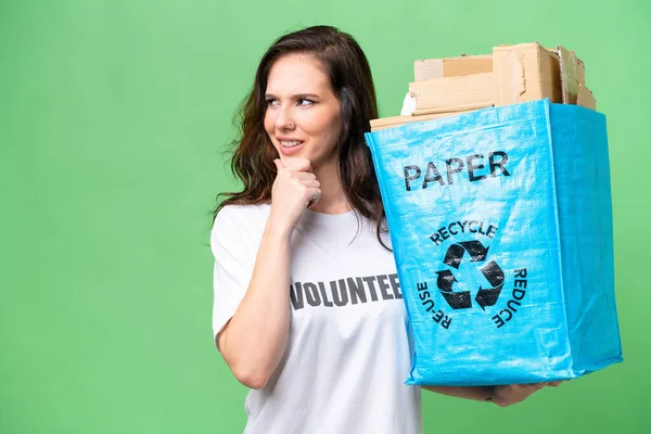 Young Caucasian Woman Holding Recycling Bag Full Paper Recycle Isolated — Stock Photo, Image
