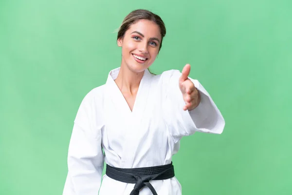 Joven Uruguaya Haciendo Karate Sobre Fondo Aislado Dándose Mano Para — Foto de Stock