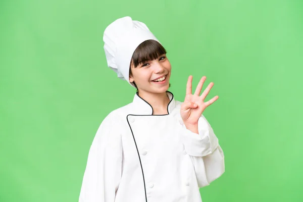 Piccola Ragazza Chef Caucasico Sfondo Isolato Felice Contando Quattro Con — Foto Stock