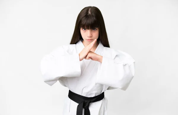 Pequeña Chica Caucásica Sobre Fondo Blanco Aislado Haciendo Karate Saludando —  Fotos de Stock