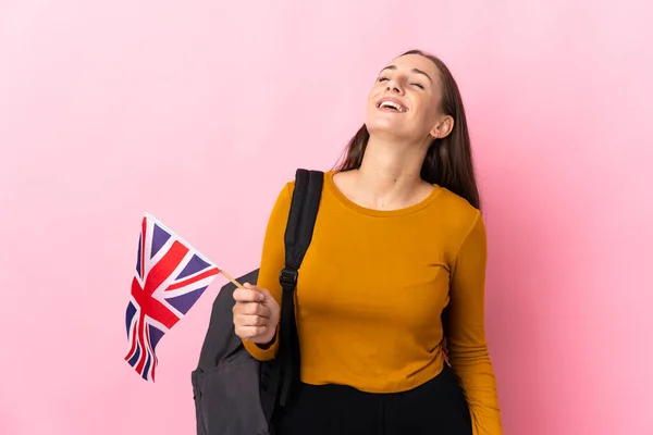 イギリス国旗を手にした若いヒスパニック女性が笑っている — ストック写真