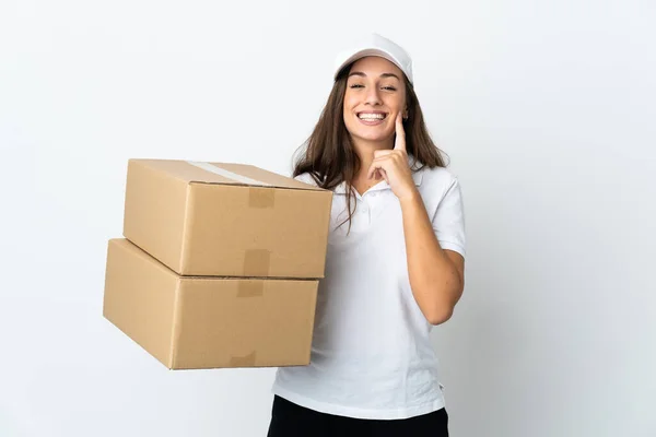 stock image Young delivery woman over isolated white background smiling with a happy and pleasant expression
