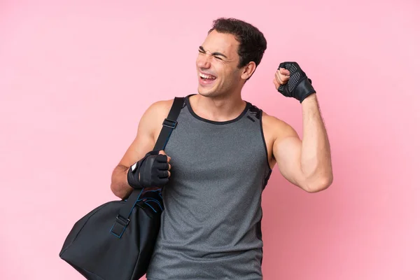 Young Sport Caucasian Man Sport Bag Isolated Pink Background Celebrating — 스톡 사진