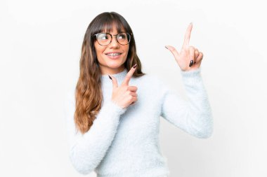 Young caucasian woman over isolated white background pointing with the index finger a great idea