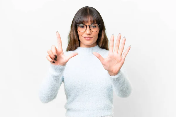 stock image Young caucasian woman over isolated white background counting seven with fingers