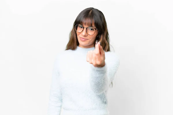 stock image Young caucasian woman over isolated white background making money gesture