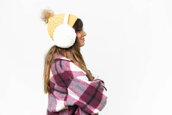 Young Caucasian Woman Wearing Winter Muffs Isolated White Background Lateral — Foto Stock