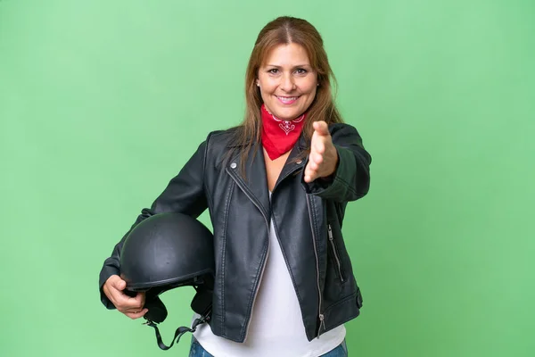 Middle Aged Caucasian Woman Motorcycle Helmet Isolated Background Shaking Hands — Stock Photo, Image