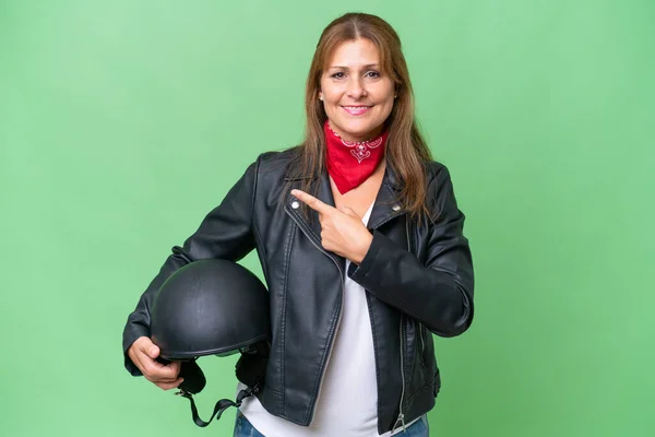 Middle Aged Caucasian Woman Motorcycle Helmet Isolated Background Pointing Side — Stock Photo, Image