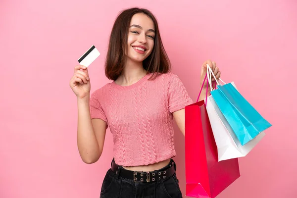 Young Ukrainian Woman Isolated Pink Background Holding Shopping Bags Credit — Zdjęcie stockowe