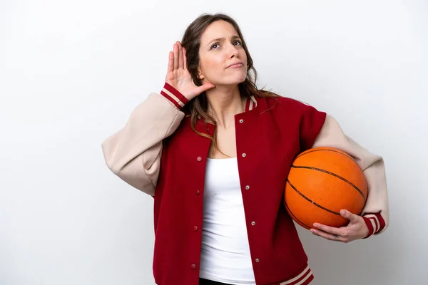 Young Caucasian Woman Playing Basketball Isolated White Background Listening Something — Stock fotografie