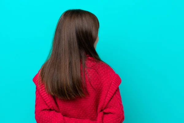 Little Caucasian Girl Isolated Blue Background Back Position Looking Back — Stock Photo, Image