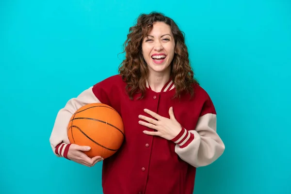 Young Caucasian Basketball Player Woman Isolated Blue Background Smiling Lot — Foto de Stock