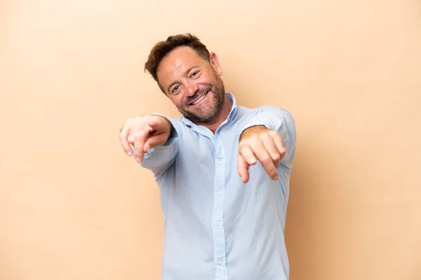 Middle Age Caucasian Man Isolated Beige Background Pointing Front Happy — Stock Photo, Image