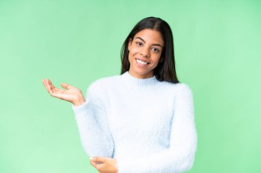 Young African American woman over isolated chroma key background having doubts