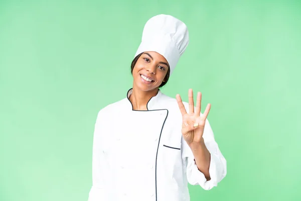 stock image Young African American chef over isolated chroma key background happy and counting four with fingers