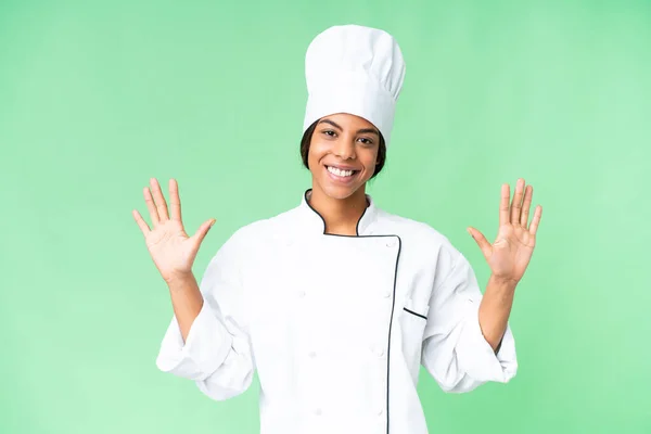 年轻的非洲裔美国厨师在孤立的色键背景计数十个手指 — 图库照片