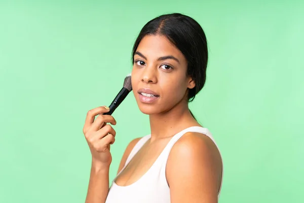 Joven Mujer Sobre Aislado Croma Clave Fondo Celebración Maquillaje Cepillo — Foto de Stock