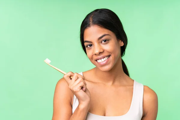 Jonge Vrouw Geïsoleerde Chroma Key Achtergrond Met Een Tandenborstel — Stockfoto