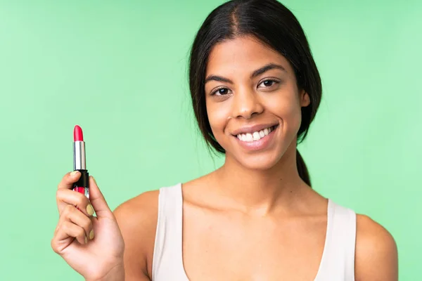 Young Woman Isolated Chroma Key Background Holding Red Lipstick — Foto Stock