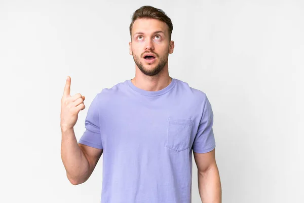 Young Handsome Caucasian Man Isolated White Background Pointing Surprised — Stock Photo, Image