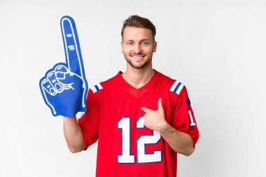 Young caucasian sports fan man over isolated white background with surprise facial expression