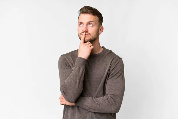 Young Handsome Caucasian Man Isolated White Background Having Doubts While — Stock Photo, Image