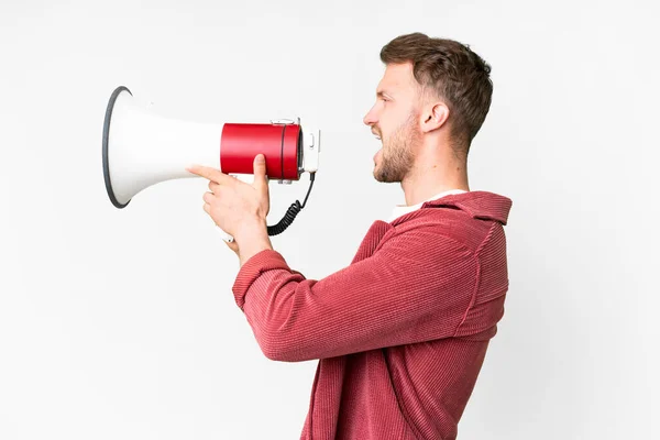 Young Handsome Caucasian Man Isolated White Background Shouting Megaphone —  Fotos de Stock