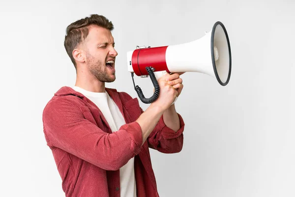 Young Handsome Caucasian Man Isolated White Background Shouting Megaphone —  Fotos de Stock