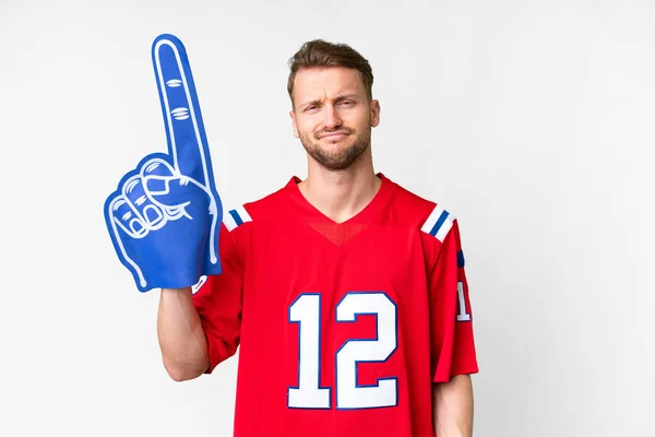 stock image Young caucasian sports fan man over isolated white background with sad expression