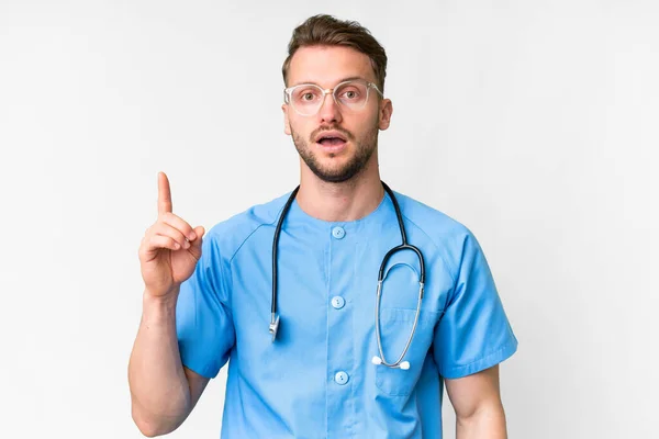 Young Nurse Man Isolated White Background Thinking Idea Pointing Finger — Stock Photo, Image