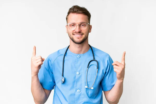 Young Nurse Man Isolated White Background Pointing Great Idea — Stock Photo, Image