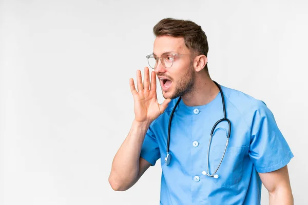 Young Nurse Man Isolated White Background Shouting Mouth Wide Open — Stock Photo, Image