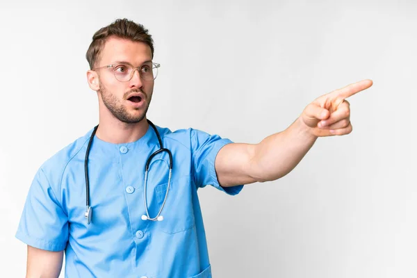 Young Nurse Man Isolated White Background Pointing Away — Stock Photo, Image