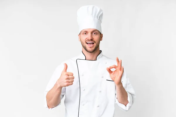 Young Caucasian Chef Isolated White Background Showing Sign Thumb Gesture — Zdjęcie stockowe