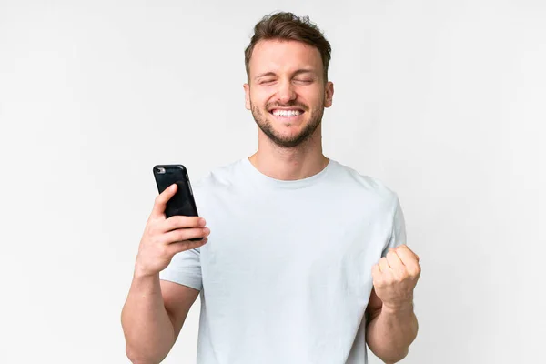 Young Handsome Caucasian Man Isolated White Background Using Mobile Phone — Stock Photo, Image