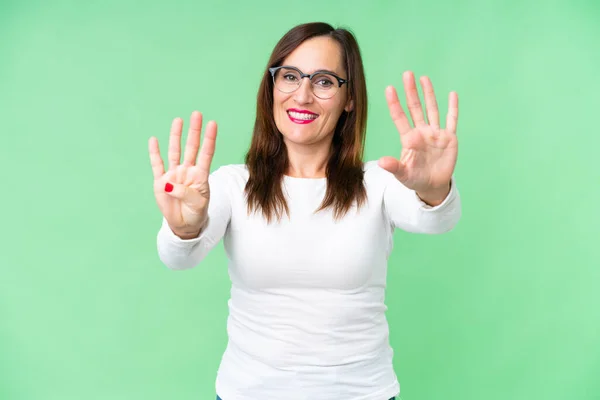 Middle Age Woman Isolated Chroma Key Background Counting Nine Fingers — Stock fotografie