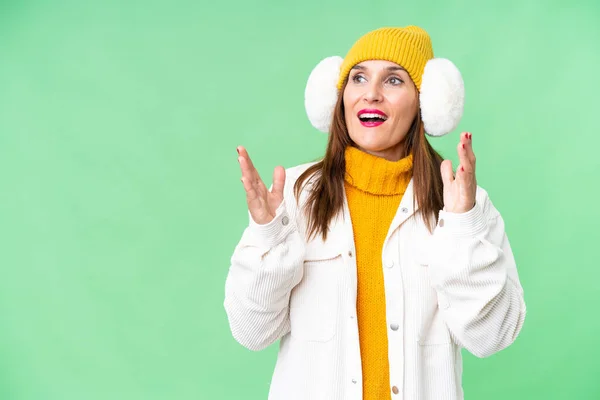 Middle Age Woman Wearing Winter Muffs Isolated Chroma Key Background — 图库照片
