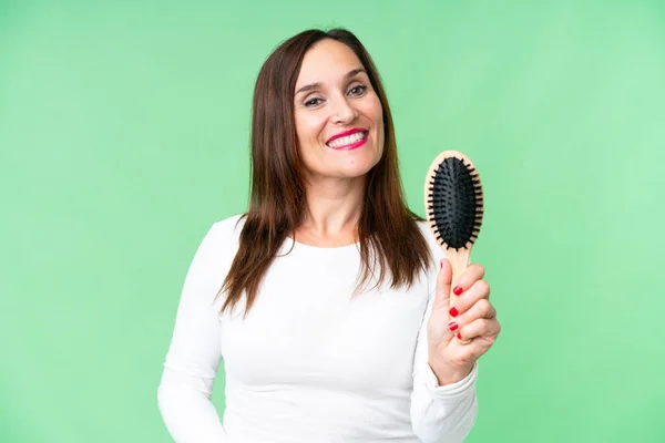 stock image Middle age woman with hair comb over isolated chroma key background with happy expression