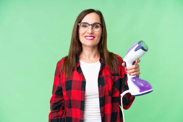 Young Woman Holding Vertical Steam Iron — Stock Photo, Image