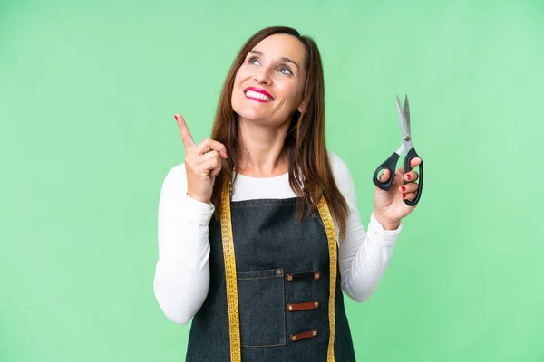Seamstress Woman Isolated Chroma Key Background Pointing Great Idea —  Fotos de Stock