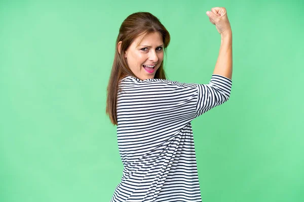 Middle Age Woman Isolated Background Doing Strong Gesture — Stockfoto
