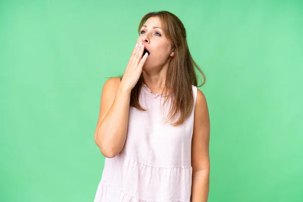 Middle Age Woman Isolated Background Yawning Covering Wide Open Mouth — Foto Stock