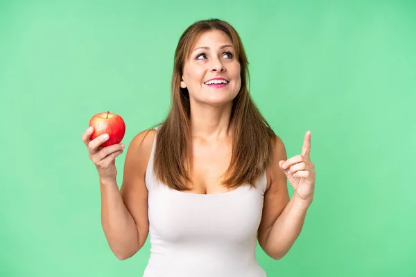 Middle Age Woman Apple Isolated Background Intending Realizes Solution While — Stock Photo, Image
