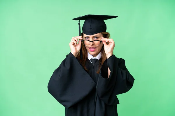 Middle Age University Graduate Woman Isolated Background Glasses Surprised — ストック写真