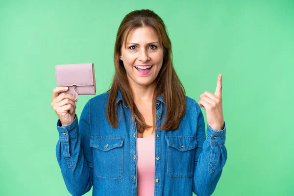 Middle Age Caucasian Woman Holding Wallet Isolated Background Pointing Great — Stock Photo, Image