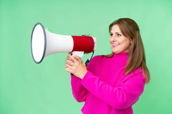 Middle Age Woman Isolated Background Shouting Megaphone Announce Something — ストック写真